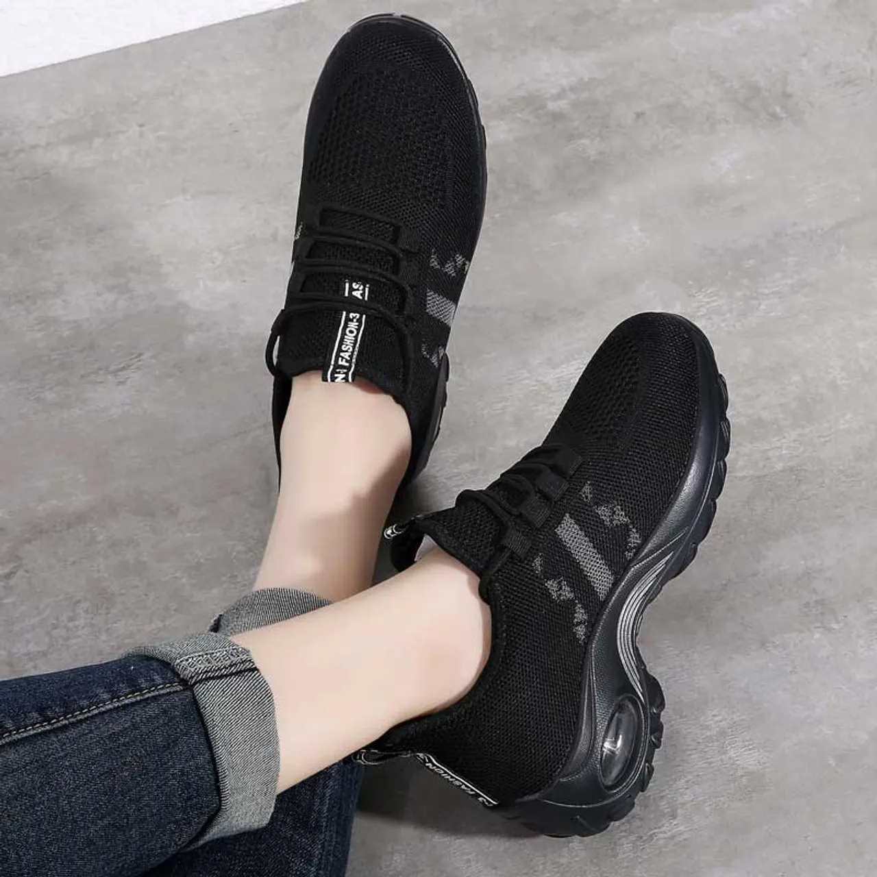 Black stripe accents double rocker bottom shoe sneaker