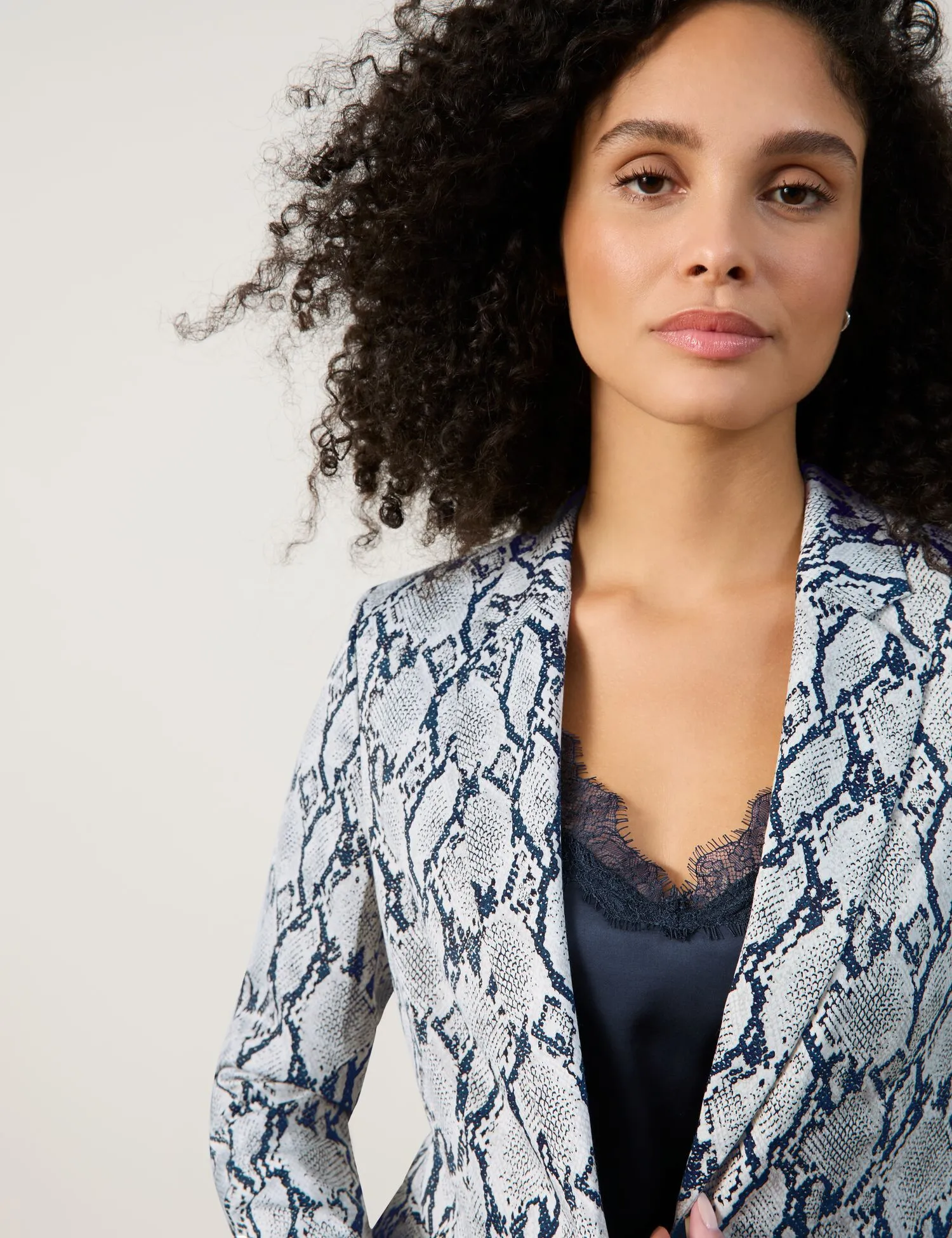 Fashionable blazer with a snakeskin pattern