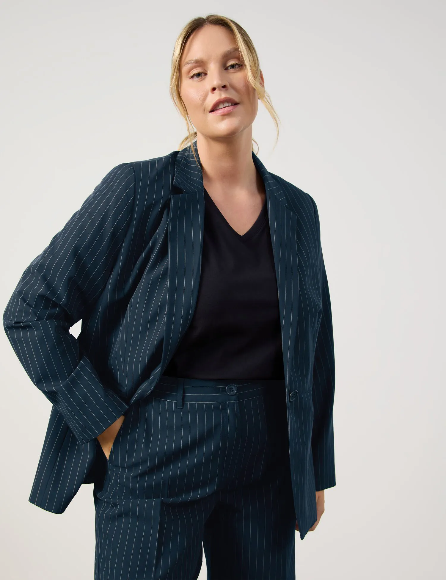 Figure-skimming blazer with fine pinstripes