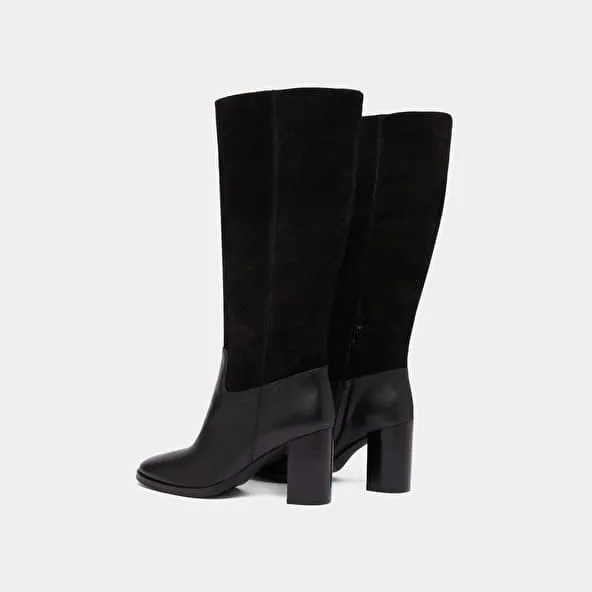 Heeled boots in black suede and black leather