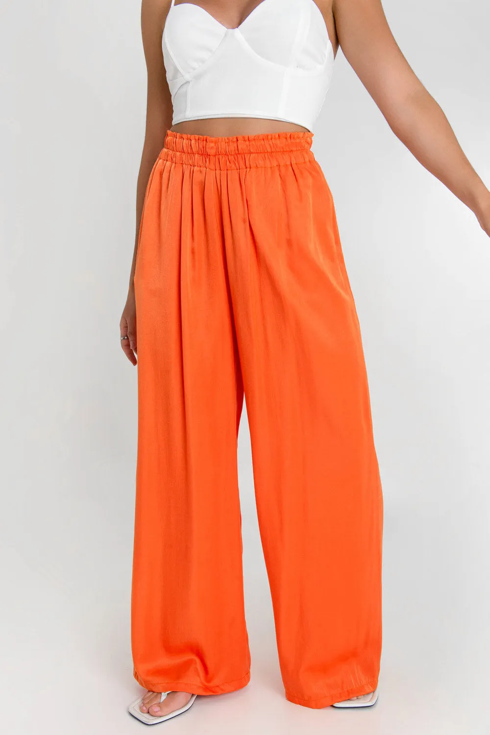 Pantalón fluido fit wide leg cintura alta elástica