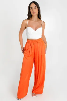 Pantalón fluido fit wide leg cintura alta elástica