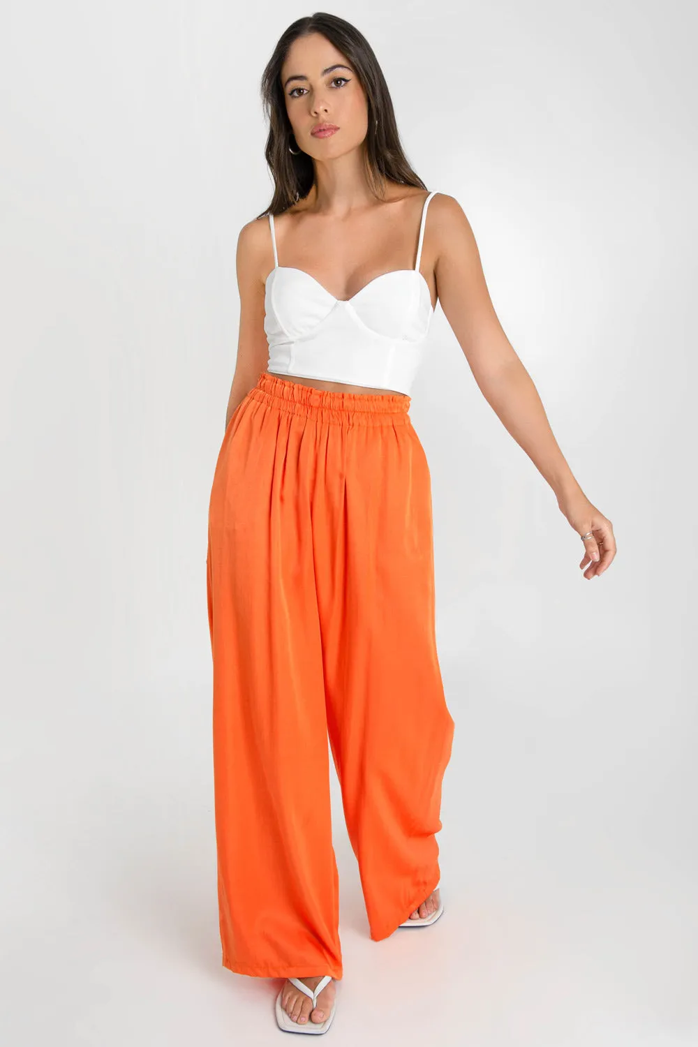 Pantalón fluido fit wide leg cintura alta elástica