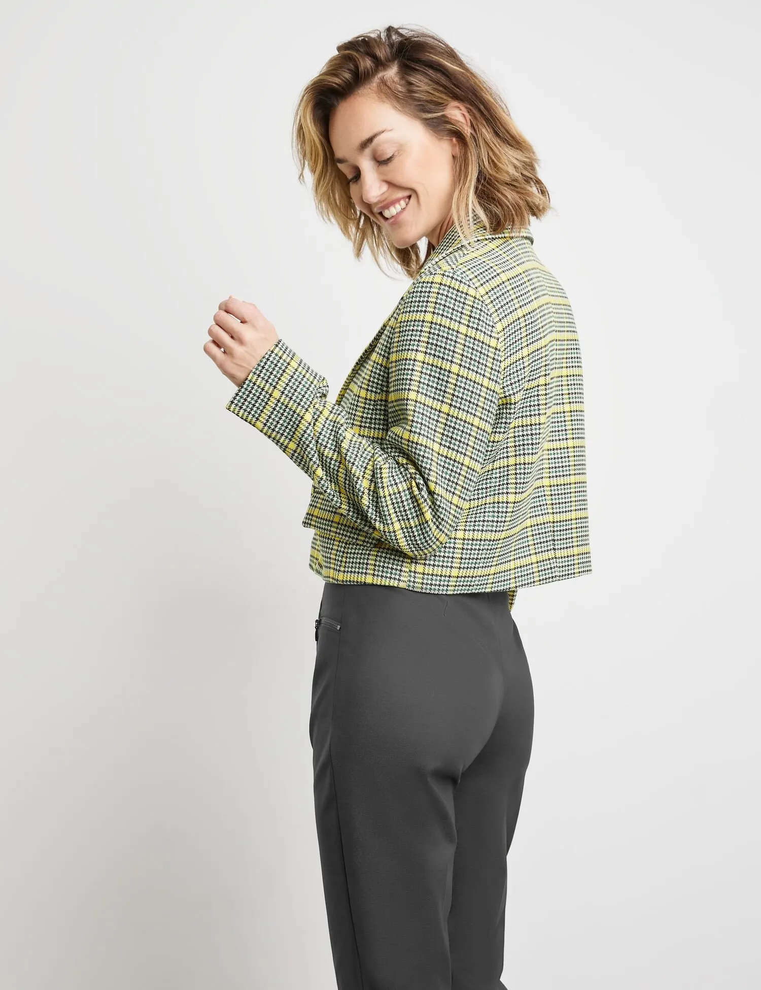 Short blazer with a check pattern